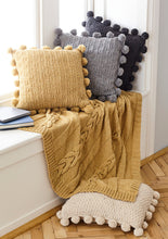 Load image into Gallery viewer, King Cole Aran Knitting Pattern - Cable Throw &amp; Pom Pom Cushion Covers (5661)