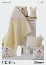 Load image into Gallery viewer, Double Knitting Pattern - Baby Banket, Cushion &amp; Hat In Cream (UKHKA 140)